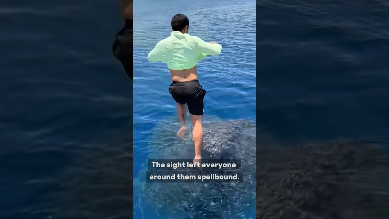 This man caught hundreds of small fish with his bare hands.