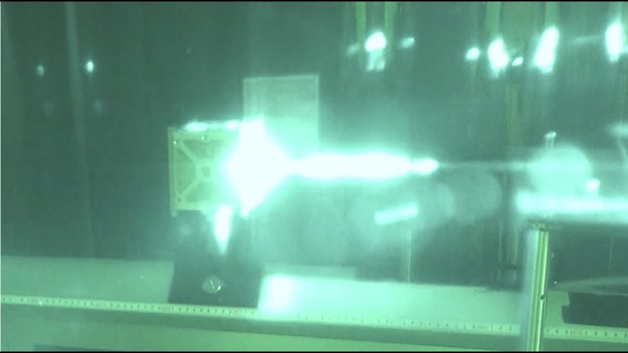 Photonic Laser Propulsion: Atmospheric Dust Effects in Beam Propagation