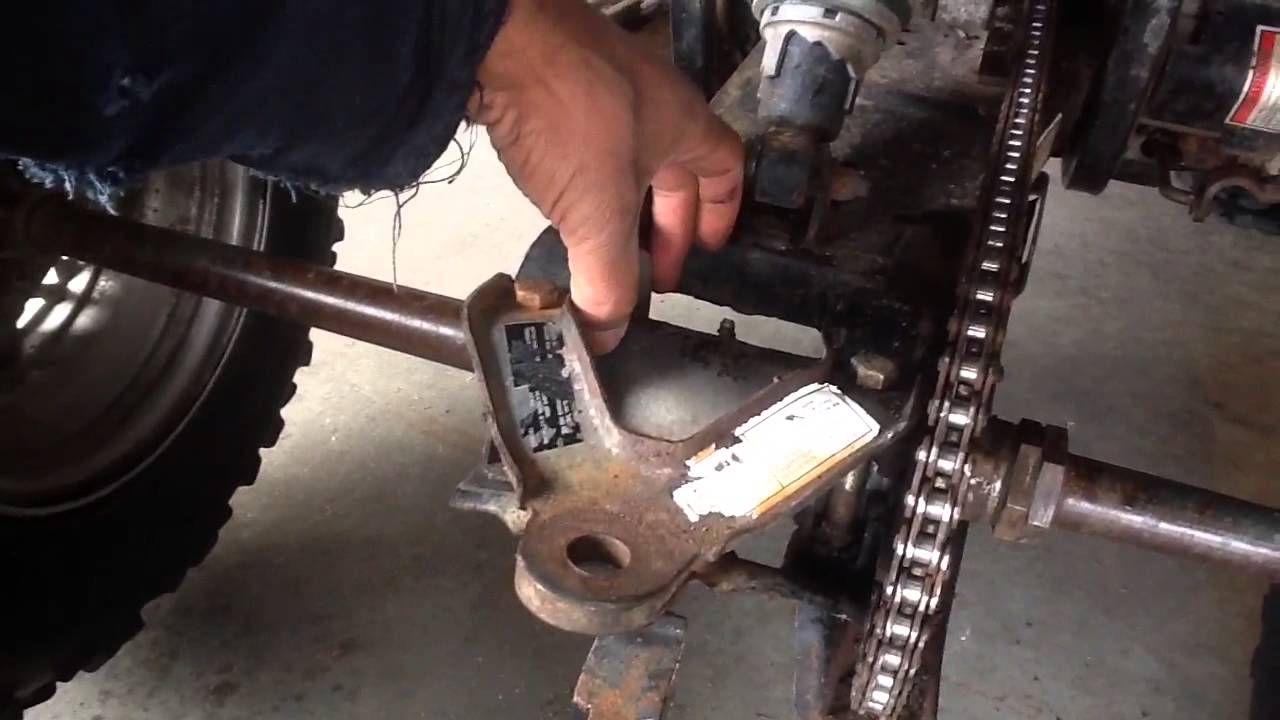 Chain adjustment on older Polaris Xplorer 300 400