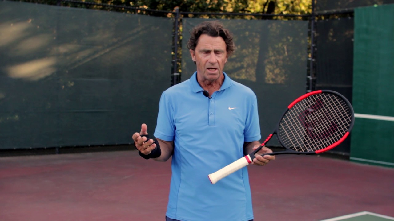 Serving with your wrist in a cast - think Pete Sampras