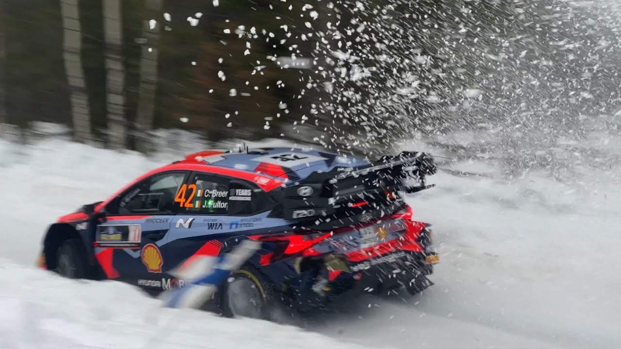 Toni Kelly chats to James Fulton after 2nd place podium finish with Craig Breen at WRC Rally Sweden