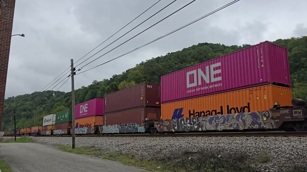NS Stack Train heading through Crum & NS Grain Train exiting tunnel outside of Kermit 9/26/25