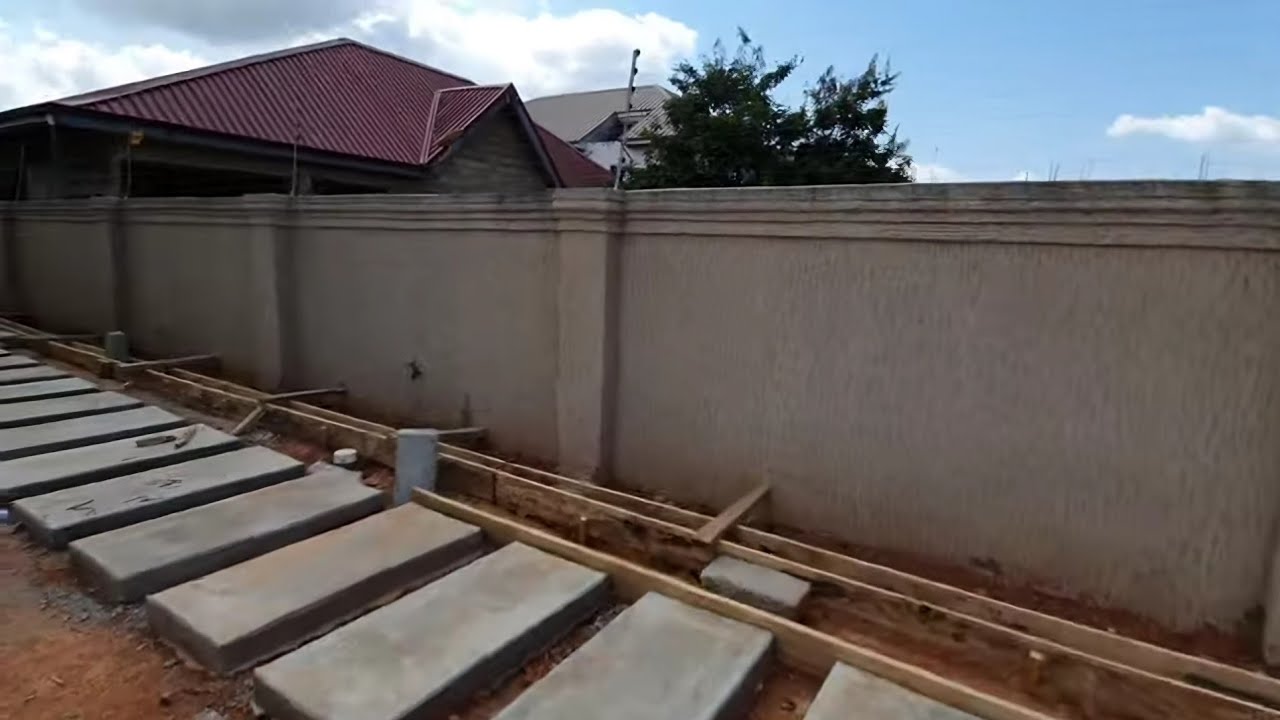Building In Ghana || THE CURRENT UPDATE ON THE SIDE WALL DESIGN AND THE DRAINAGE...