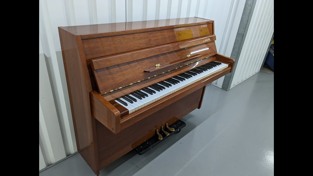 Yamaha C104 upright piano in polished glossy mahogany finish stock number 23197