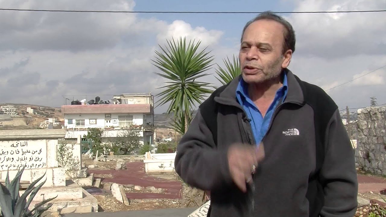 بيت حنينا معاناة الفصل والتقسيم   Beit-Hanina suffering from separation and partition