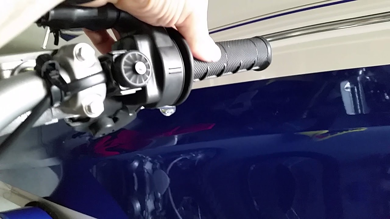 2017 RMX450Z Throttle restriction screw removal. Uncork full throttle.