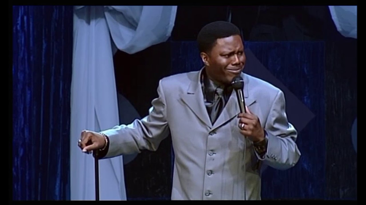 Bernie Mac breaks a microphone