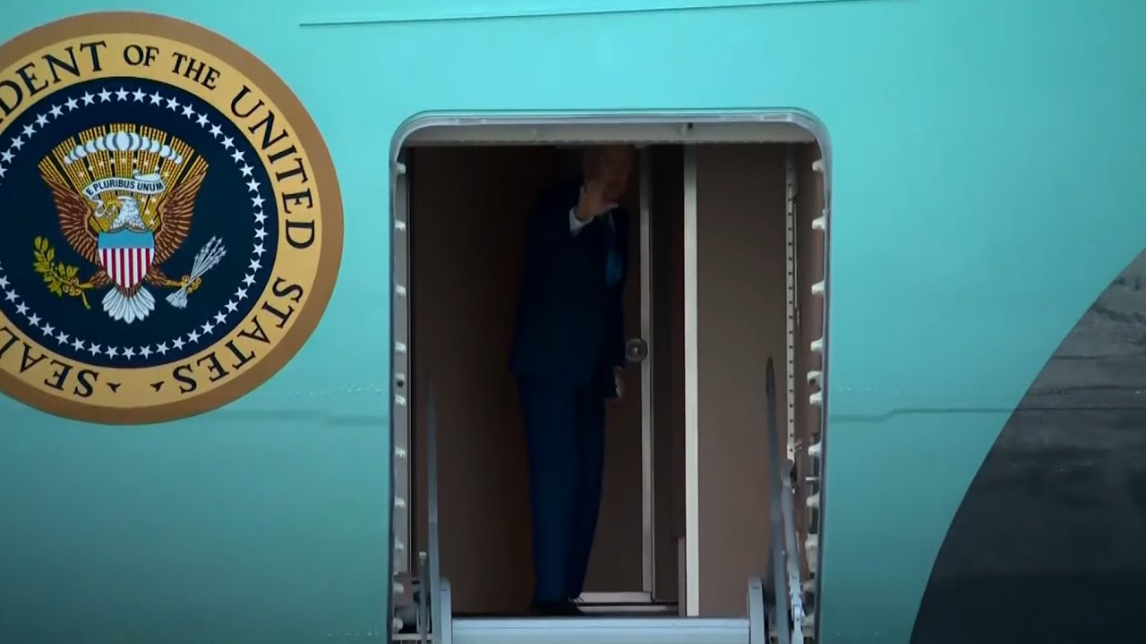 RAW: President Biden's motorcade arrives at Air Force One
