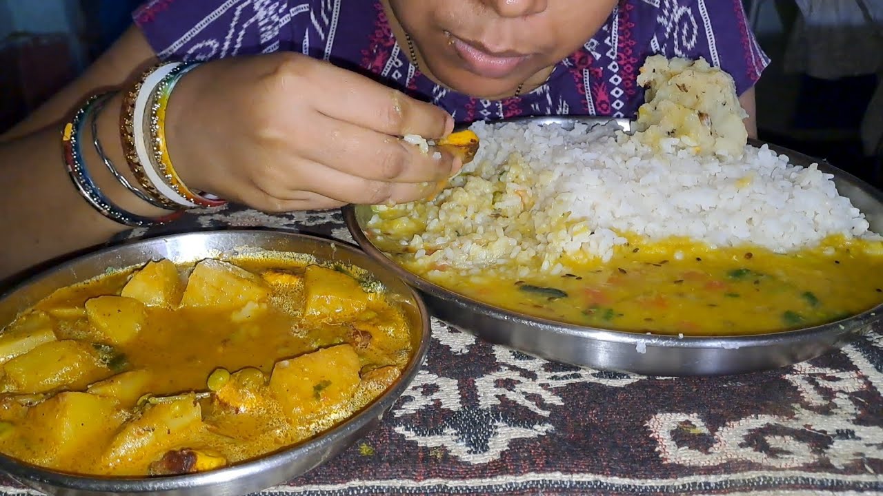 Eating Rice Daal With Alu Mattar Paneer