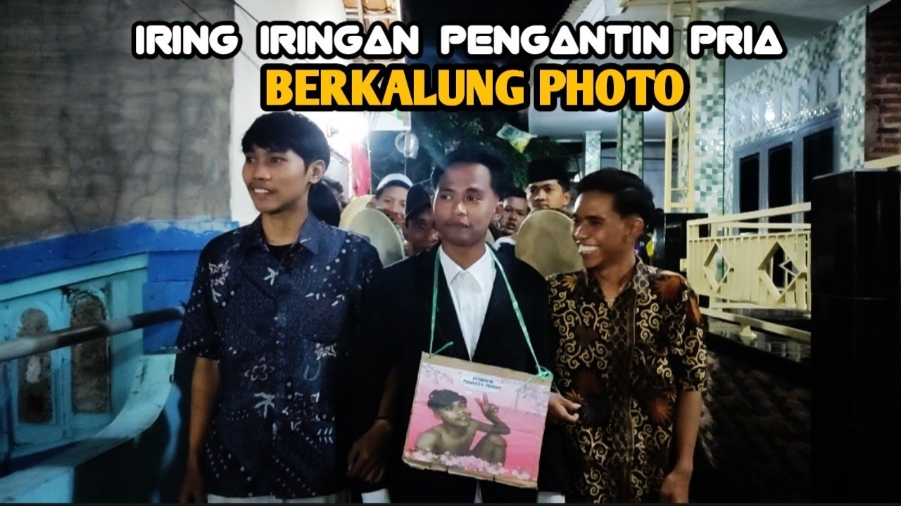 IRING IRINGAN PENGANTIN PRIA BERKALUNG PHOTO