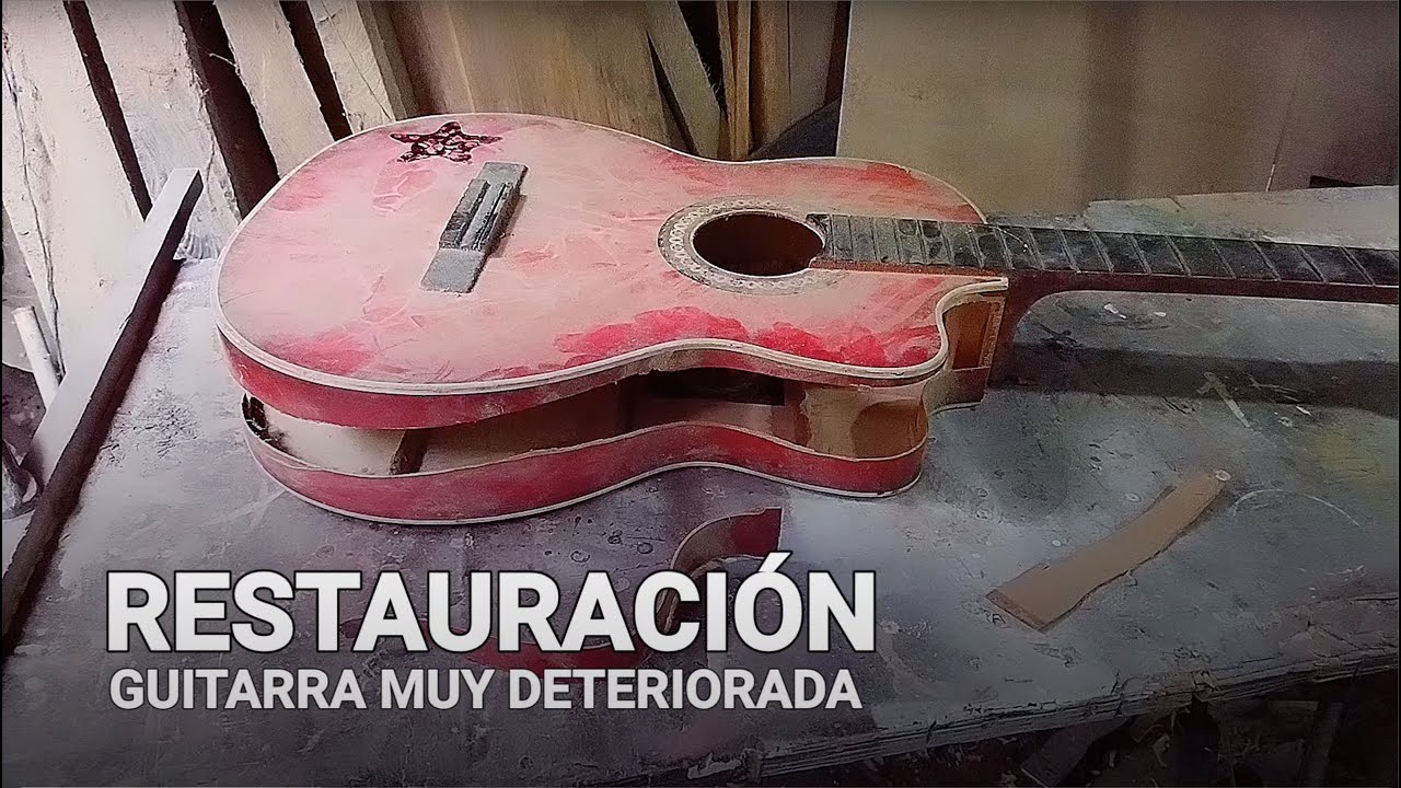Restauración de guitarra muy dañada y deteriorada.