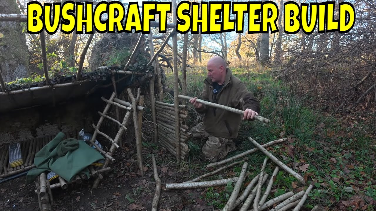 SOLO BUSHCRAFT CAMP BUILDING A SHELTER PORCH AND SIDE WALL AT THE WASP CAMP