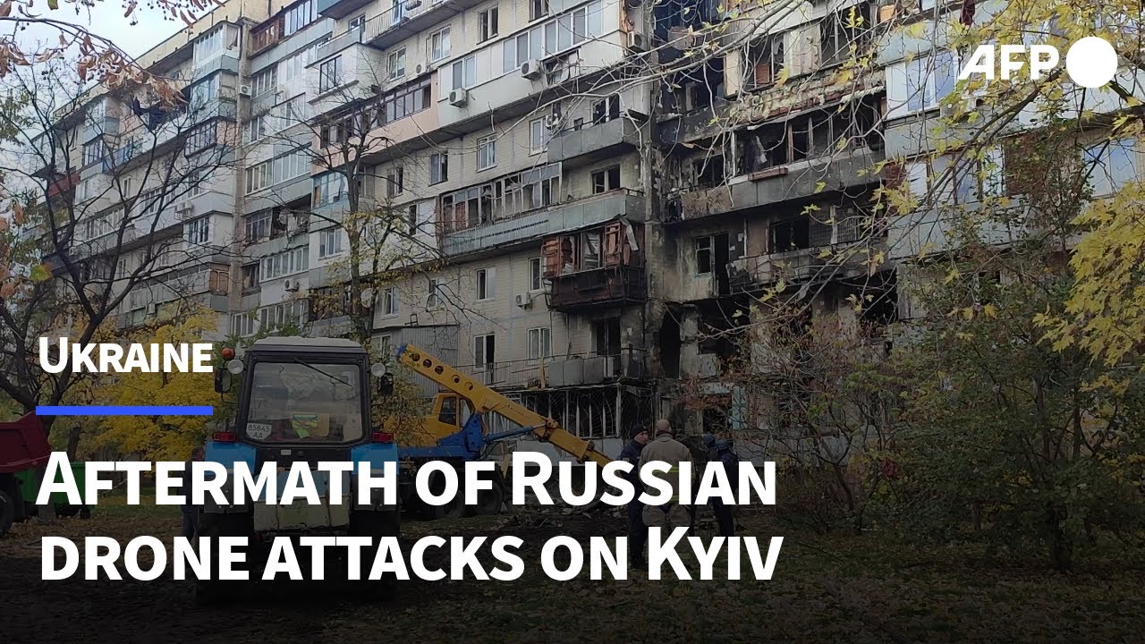 Residents clear rubble after deadly Russian strike on Kyiv | AFP