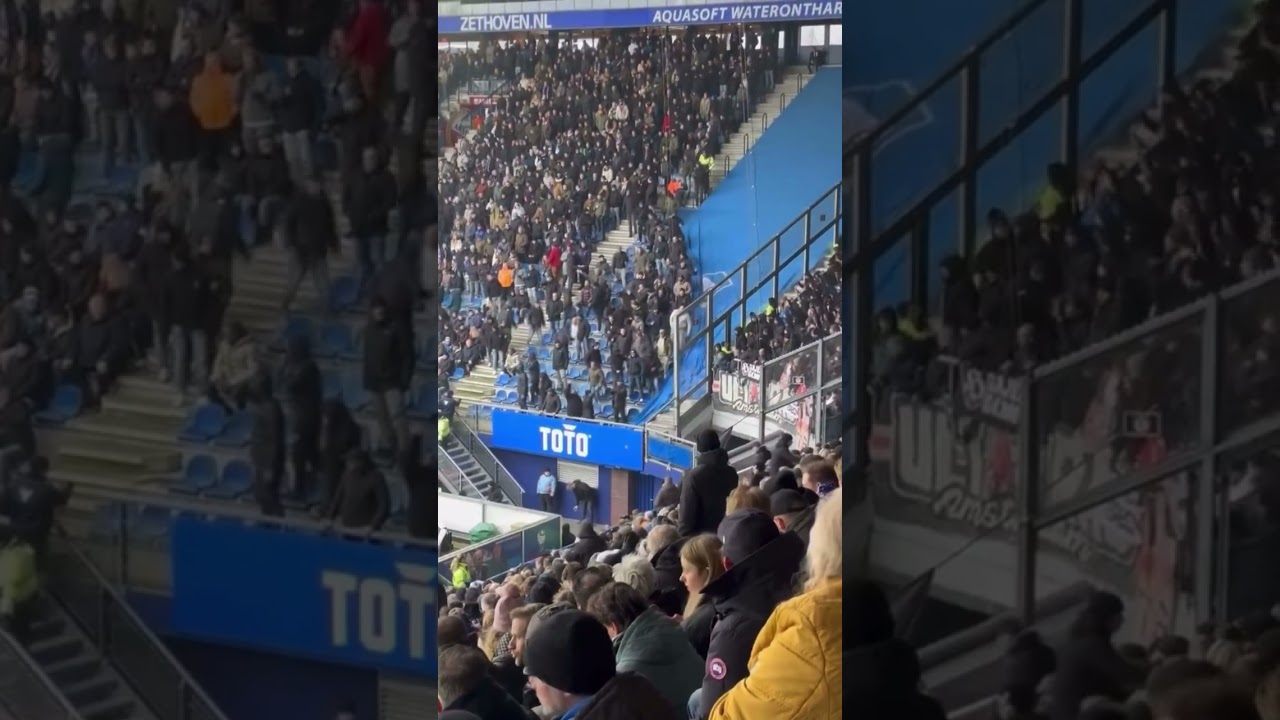 groep Ajax-supporters heeft in Heerenveen het buffervak naast het uitvak overgenomen