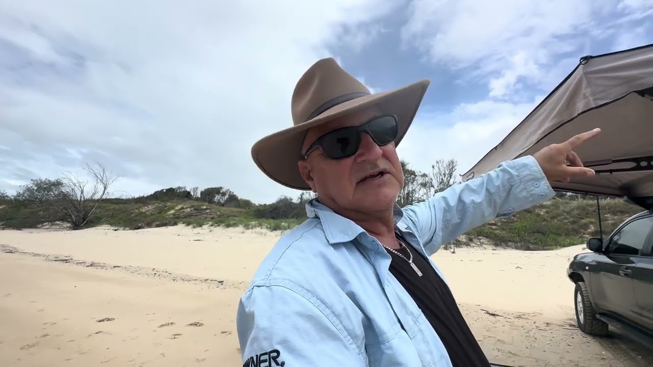 200 series LandCruiser set up on Woodgate beach kings 270 and shower/toilet tent recycled map 