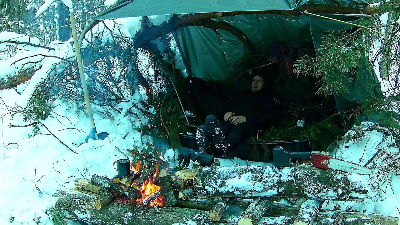 2 days wild winter bushcraft . Tarp, long log fire, no sleeping bag. Bushcraft no talk. Survived