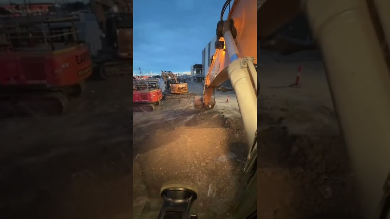 POV - Loading trucks in the dark with a Case CX350 excavator