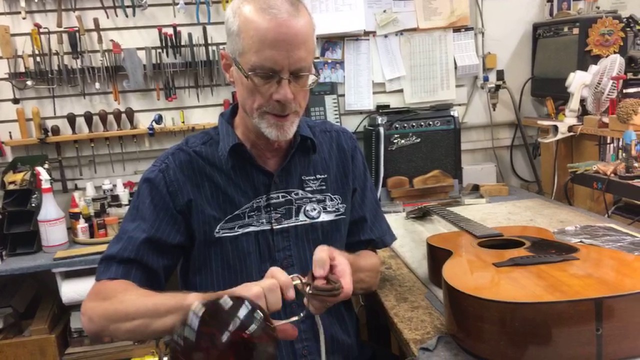 In The Shop: Removing the bridge on a Martin 00-18 from 1940!