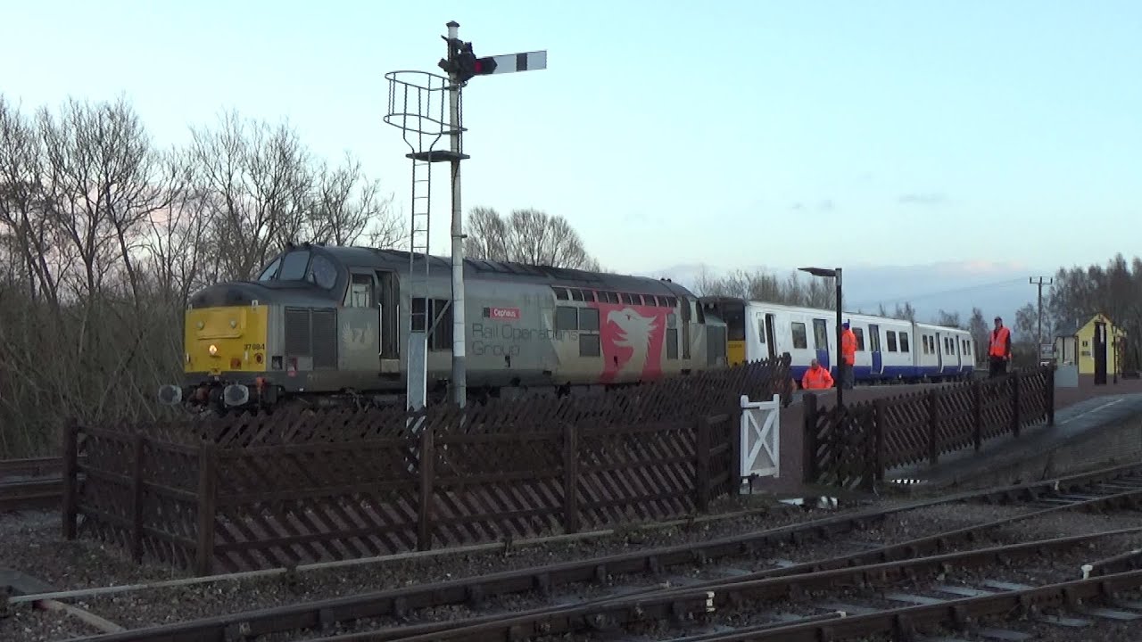 Santa, Cepheus and the EMU – 37884 delivers 315856 amidst the Forest of Dean Railway's Santa trains