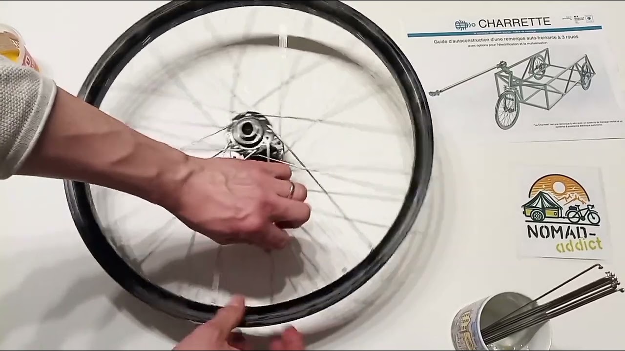 Comment rayonner ou rayonnage d'une roue de vélo. Ici pour une charette (remorque) de Véloma. Tuto.
