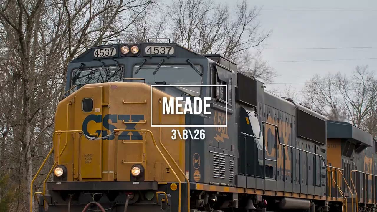 A couple of trains at Meade on the Trenton Line, EMDs and YN2s
