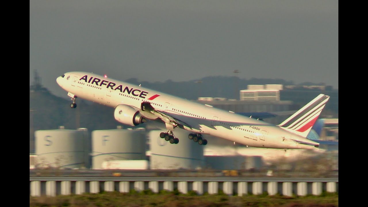 AIR FRANCE BOEING 777-300ER does a shirt steep takeoff heading from San Francisco to Paris-CDG