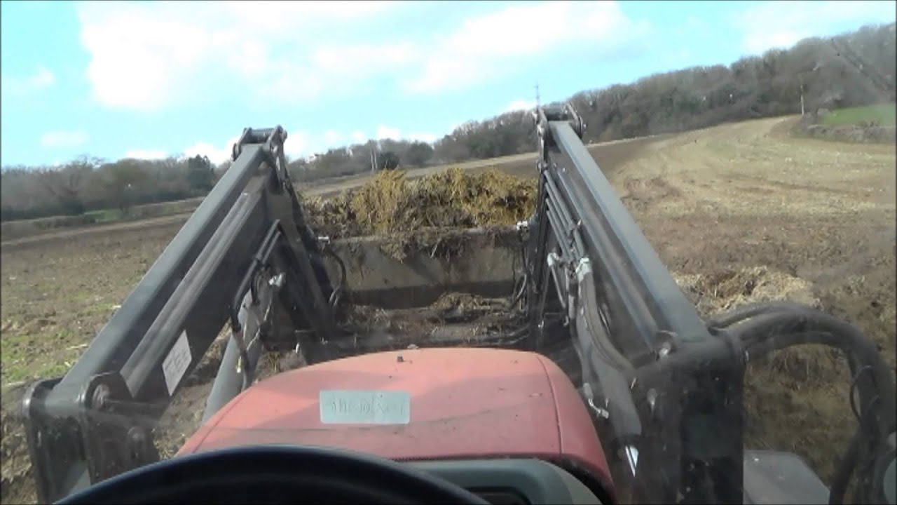 loading and spreading muck with the McCormick and Massey. Part 1