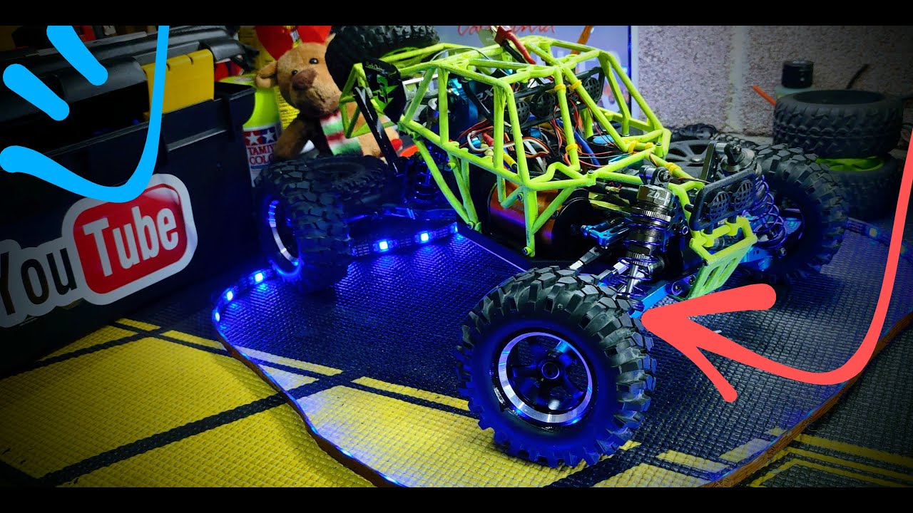 wltoys 12428-le cambiamos los neumaticos y extensores de ejes