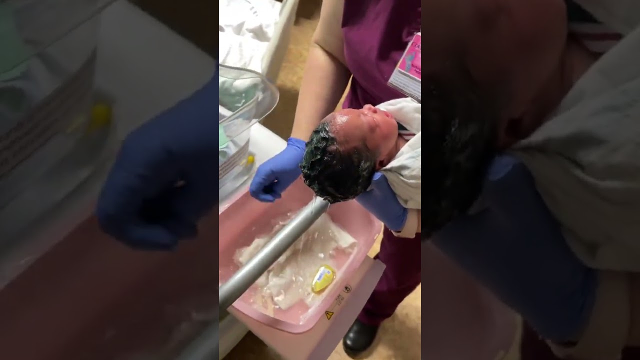 First bath of a newborn baby. 