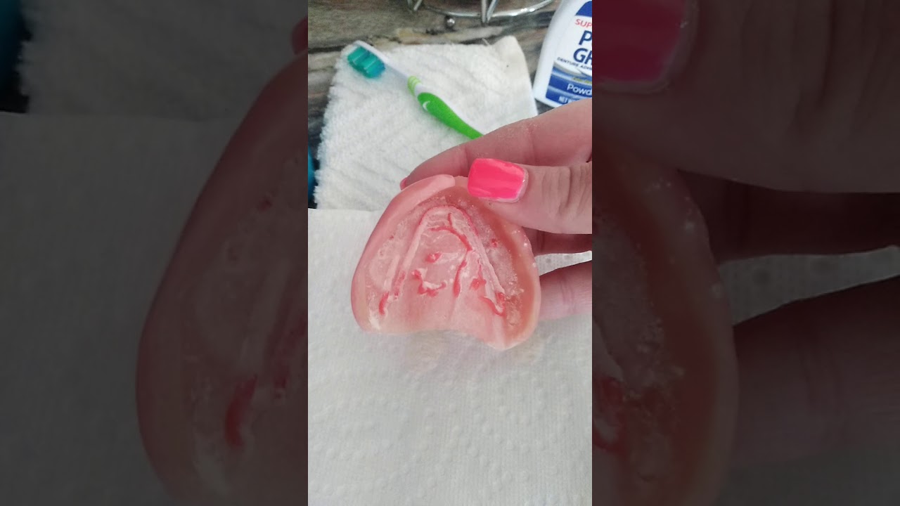 Using regular denture adhesive with powder adhesive