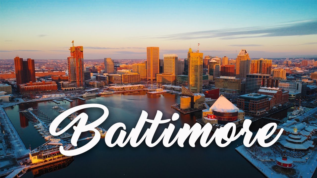 A drone flight over Baltimore in the snow -- Aerial 4k footage