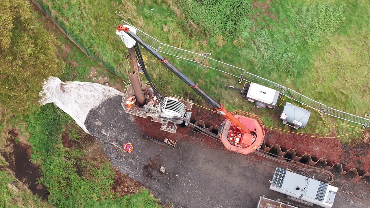 Giken ECO700S super crush piler and CB2-5 clamp crane installing sheet piles in Birmingham