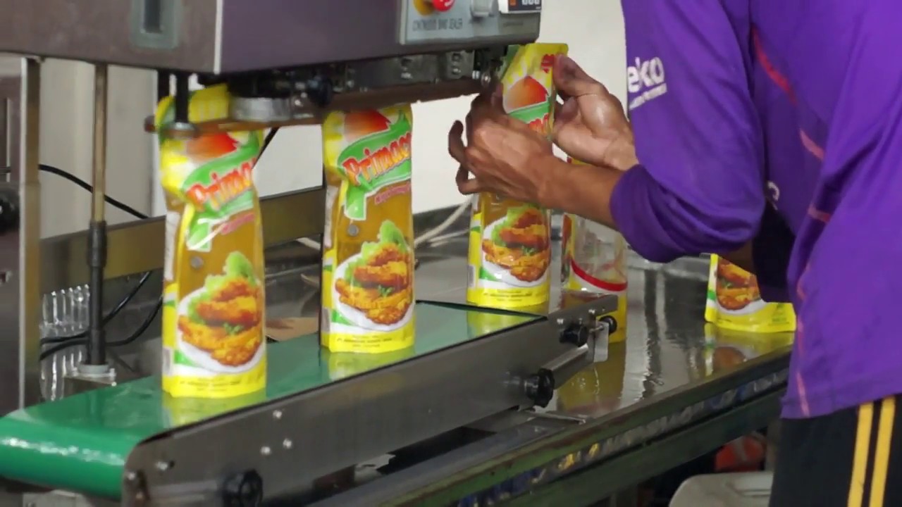 Mesin filling minyak goreng universal (botol, refill, & jerigen)