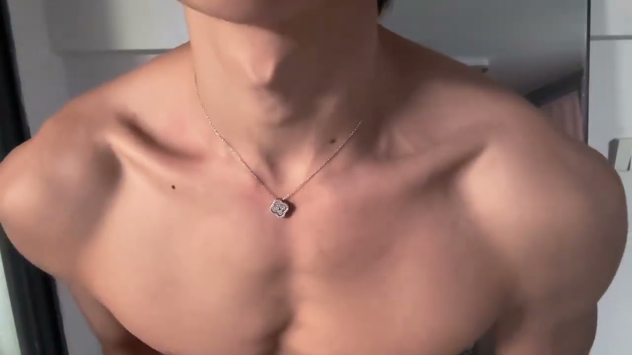 A four-leaf clover necklace decorated on the collarbone