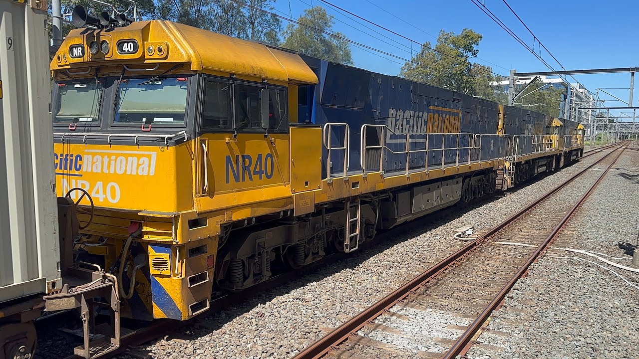 15/3/26 - Pacific National 7BM4 passing Rhodes with NR70, NR98, and NR40