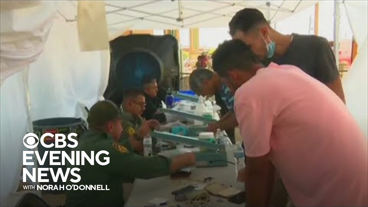 Inside processing center handling influx of migrants