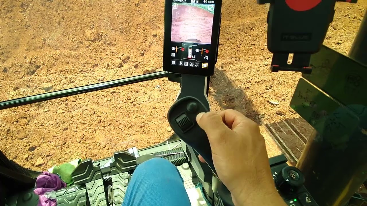 como fazer talude com a escavadeira da cat nova geração.