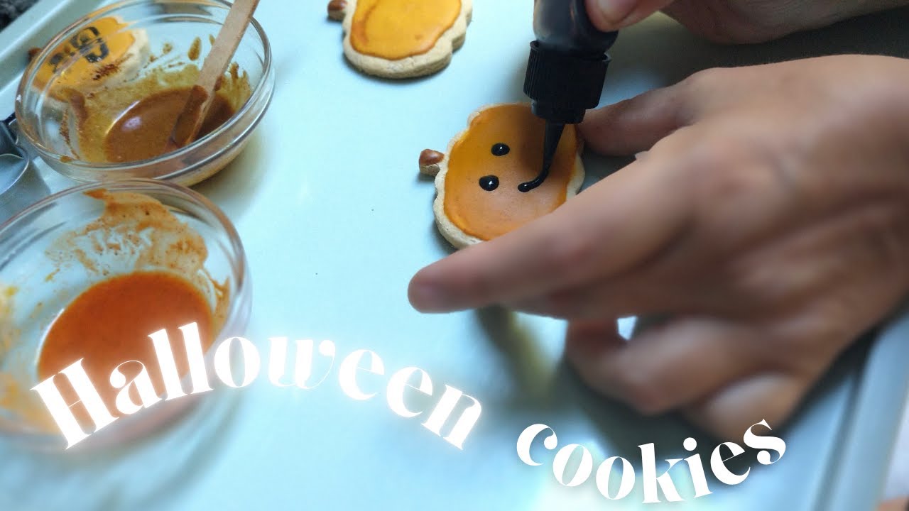 Halloween cookie decorating with naturally colored icing