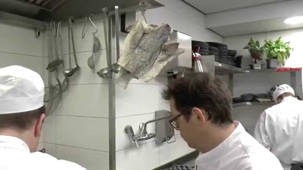 Michel Van Der Kroft prepares a signature dish at the 2 Michelin star restaurant 't Nonnetje
