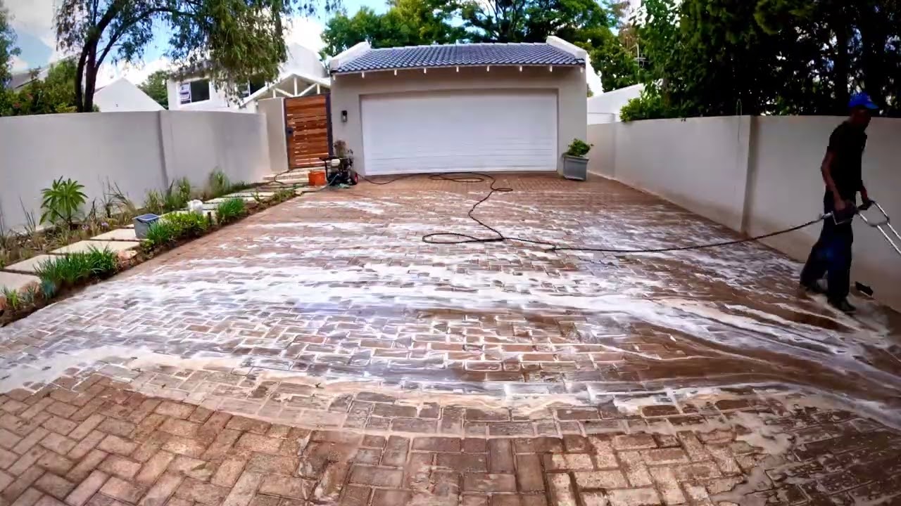Starke Pressure Washing - Driveway Clean and Tile grout removal and polymeric sand replacement 