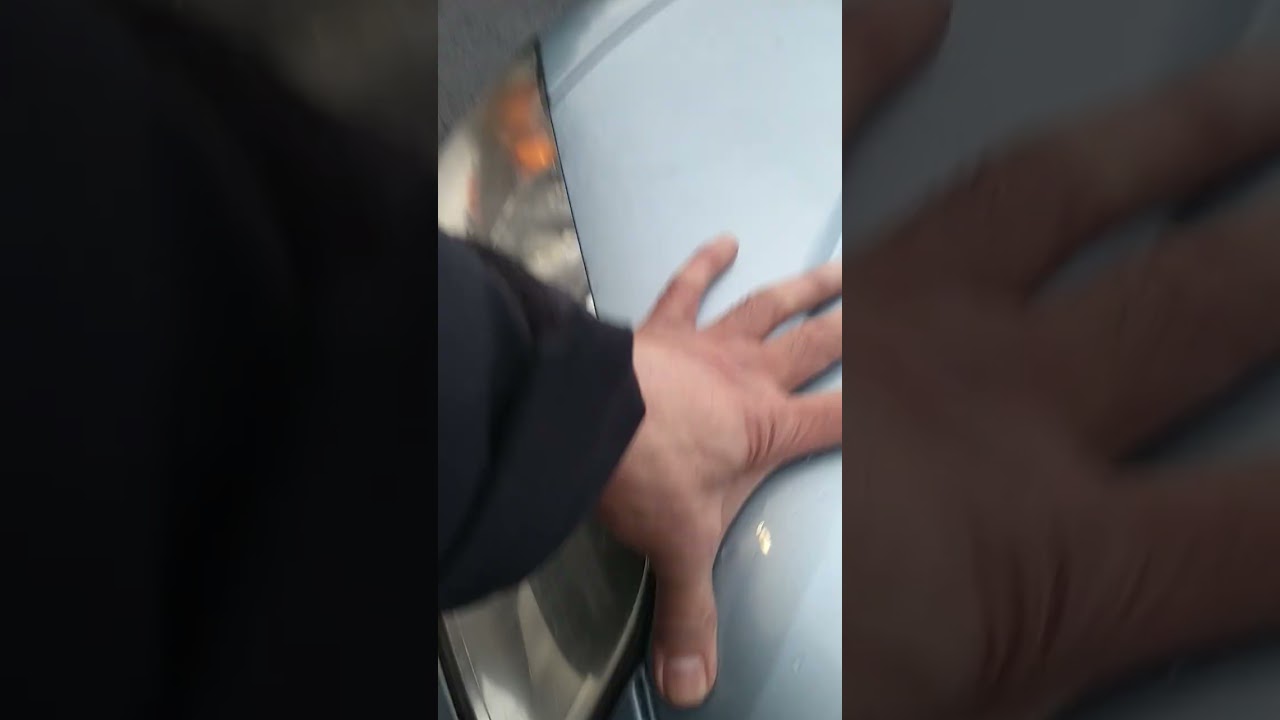 Lady Car broken down in Sainsbury car park help at hand by two gentlemen and Sainsbury's security 