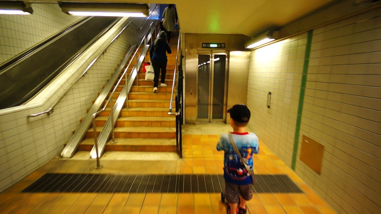 Sweden, Stockholm, Stuvsta Train Station, 2X Automatic KONE elevator, going to street level