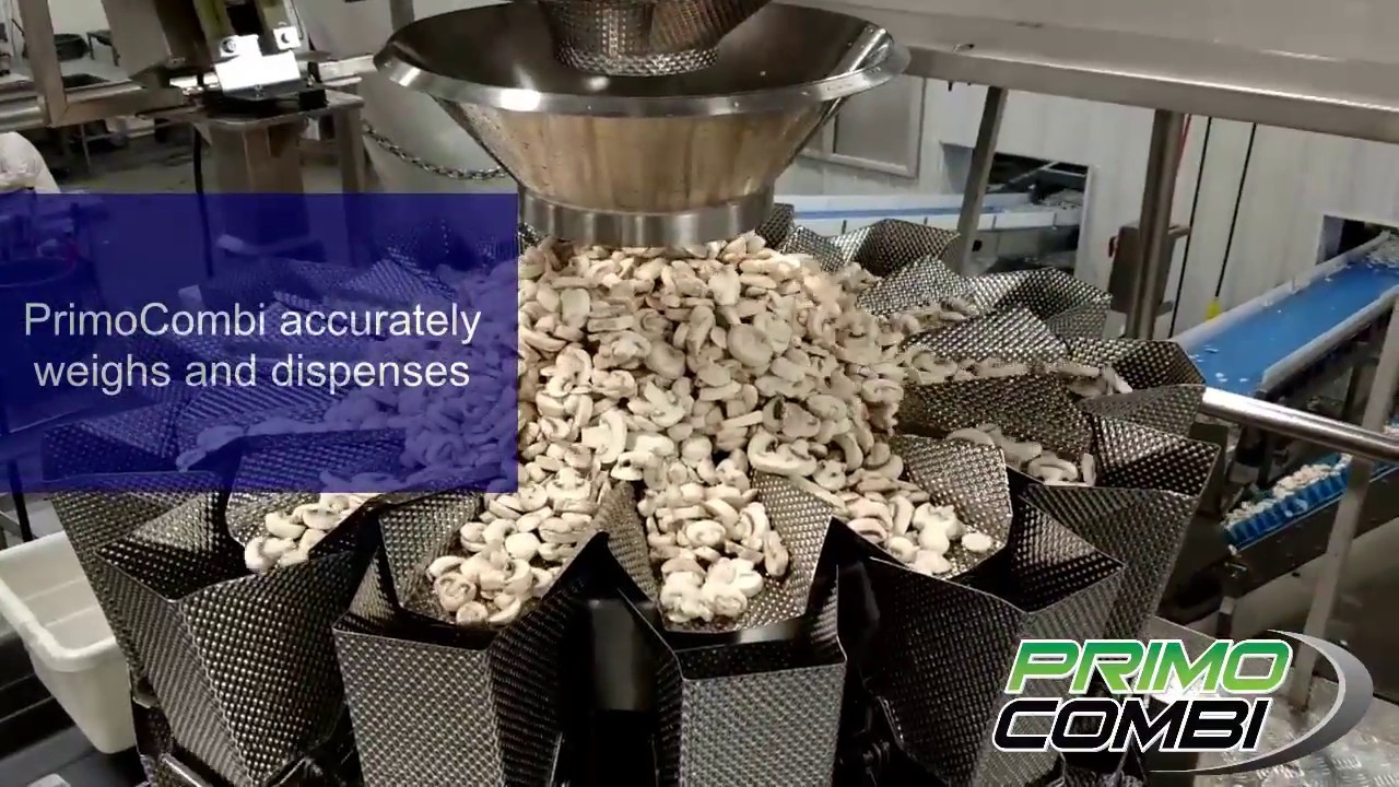 PrimoCombi multihead weigher filling sliced mushrooms into trays