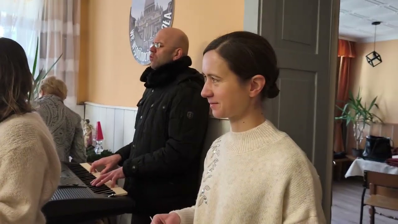 Kolędowanie, Łukasz-organista i składanie życzeń