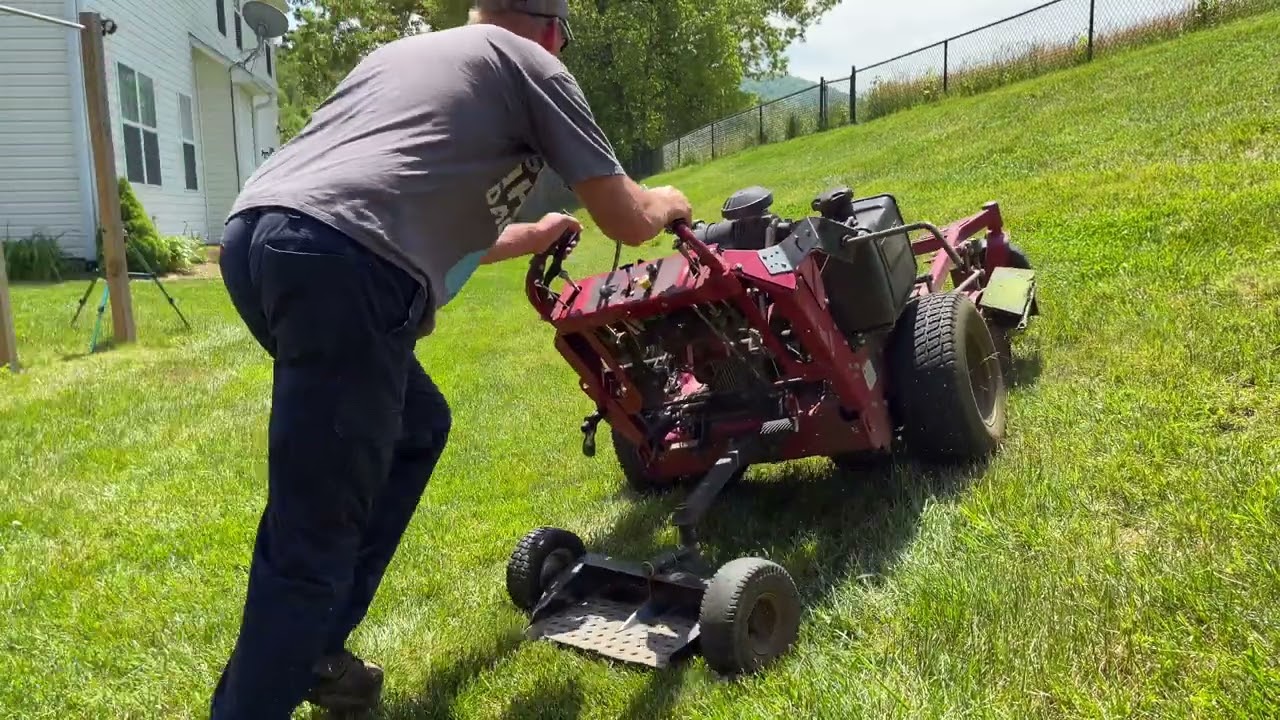 MOWING THIS STEEP HILL WITH MY WALKBEHIND MOWER