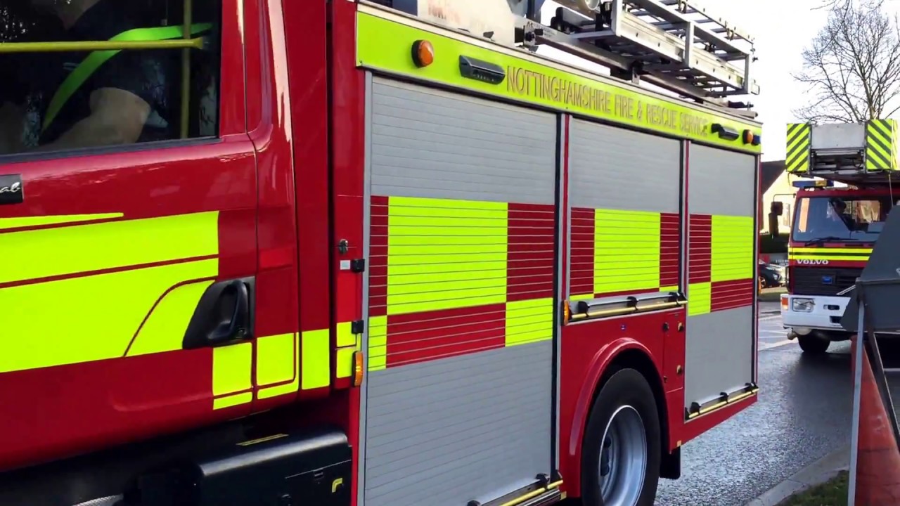 Firefighters form a guard of honour for Graham McGuigan