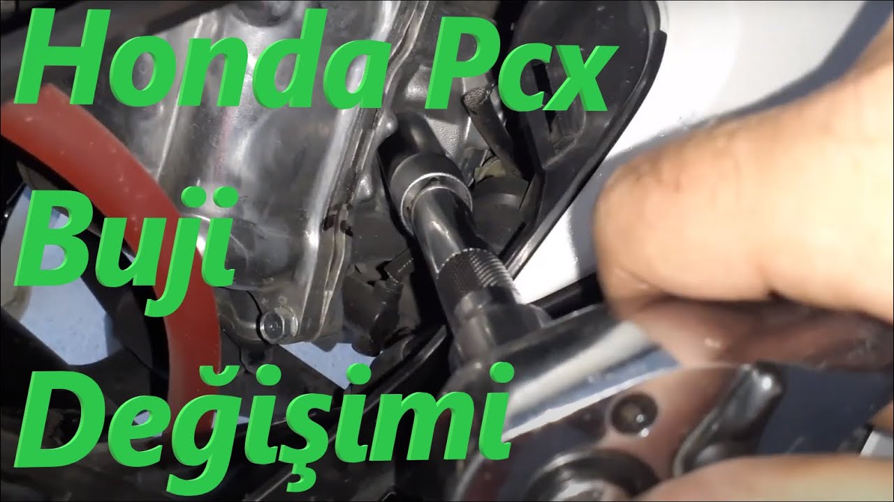 Снятие и замена свечей зажигания Honda Pcx
