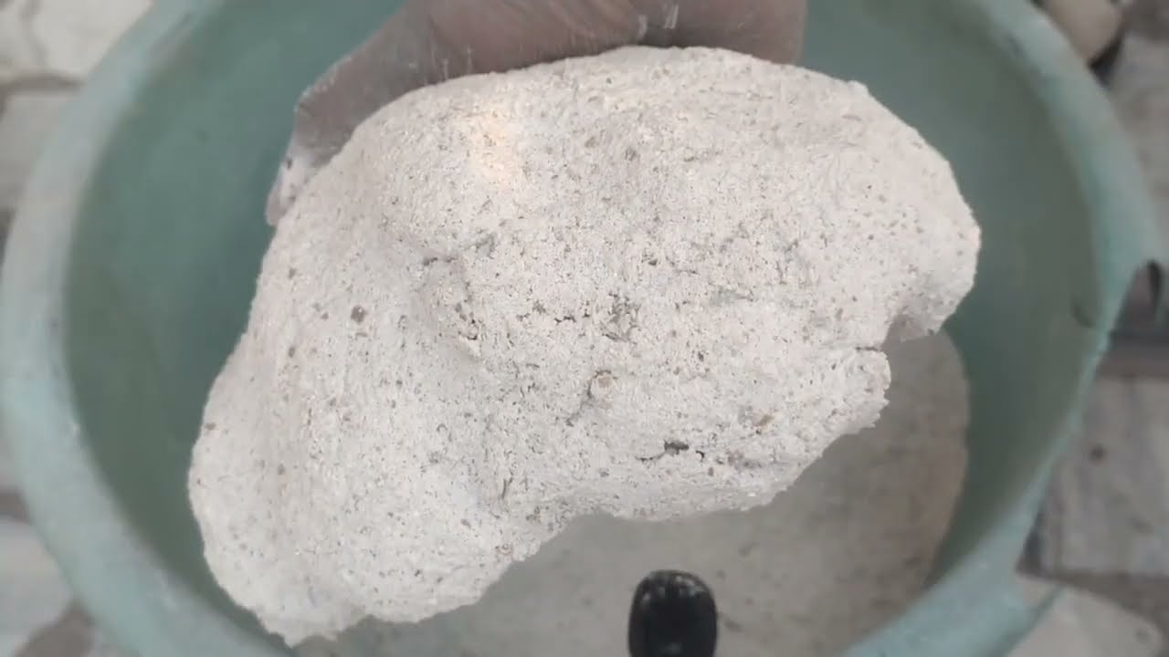 Full dry soft white cement crumbling