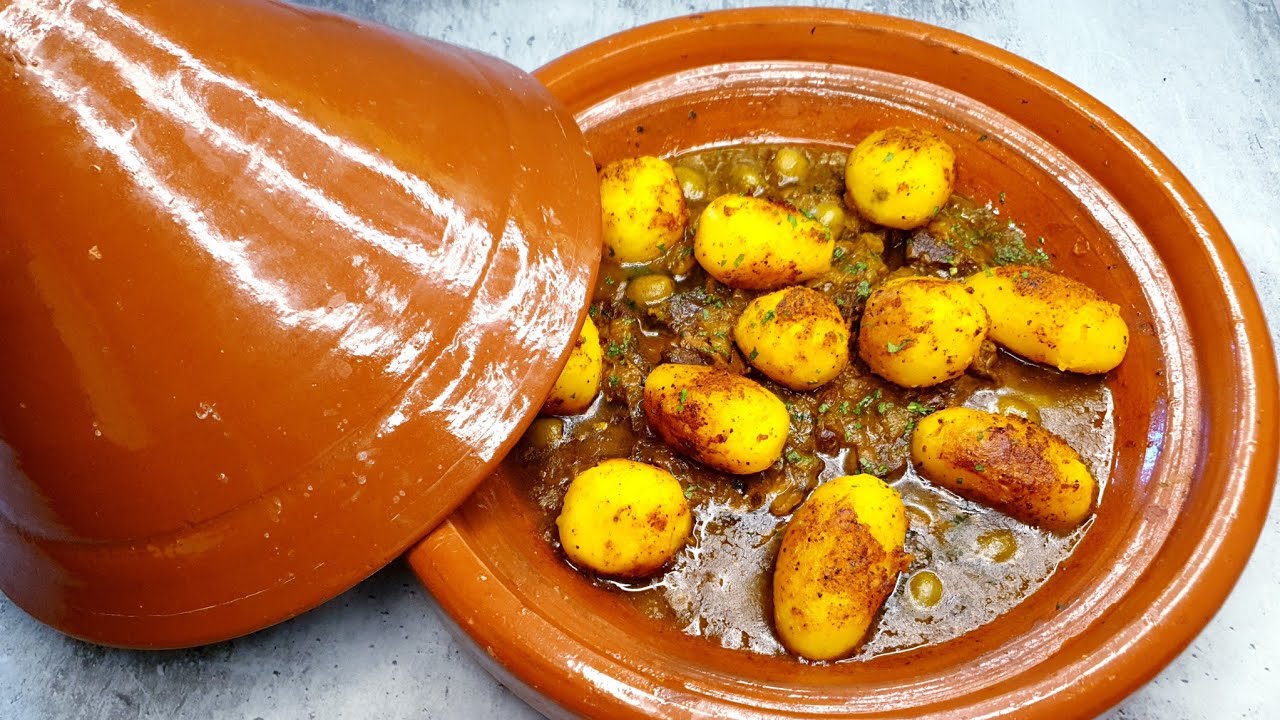 طاجين باللحم ومخضر بالبطاطا والزيتون لذيذ ومحضر بواحد الشكل سهل وأكيد البنة حاضرة شهوة لذيذة ياسلام