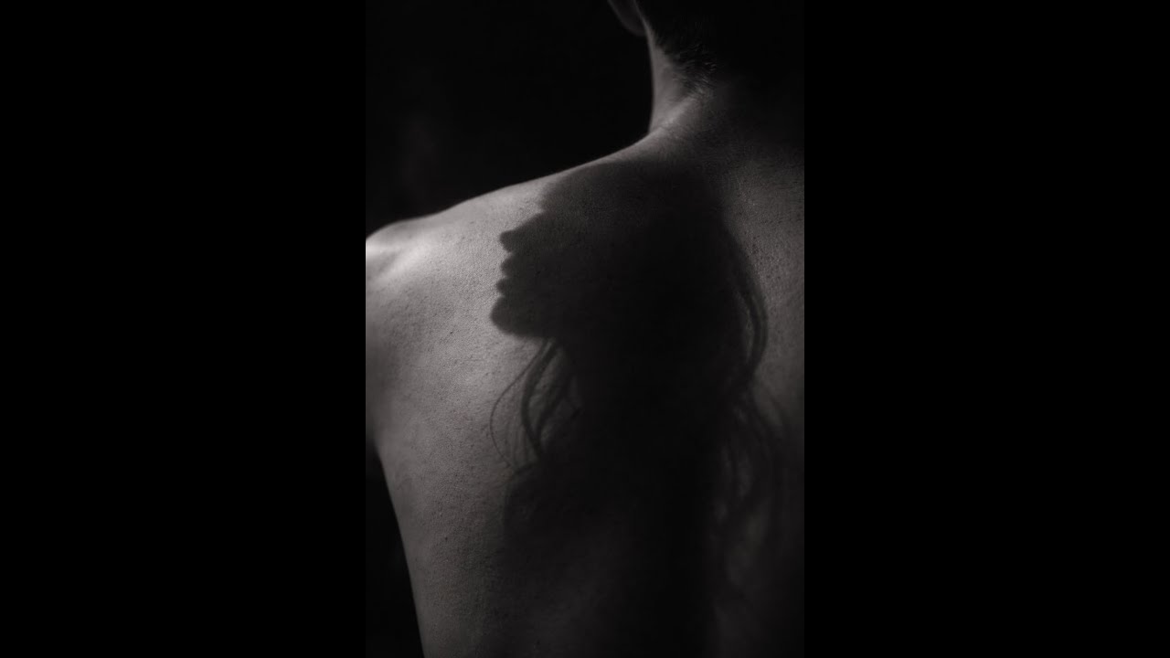 Tu sombra en mi piel